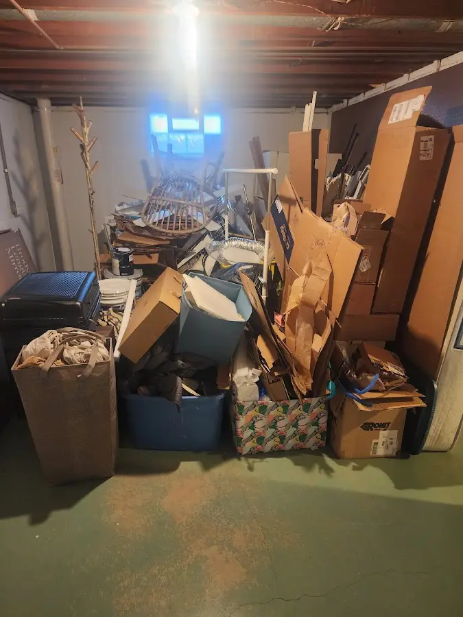 Roll-off dumpster container at job site for Yard Waste Dumpster Rental in Lochmoor Waterway Estates